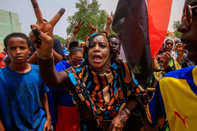 Sudanese protesters at mass demonstration against the ruling generals in Khartoum on June 30