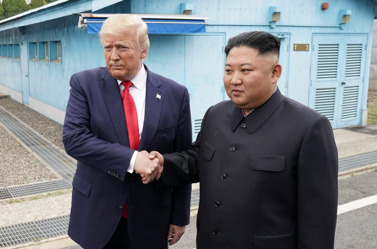 Trump becomes first sitting US president to enter North Korea as he meets Kim Jong-un