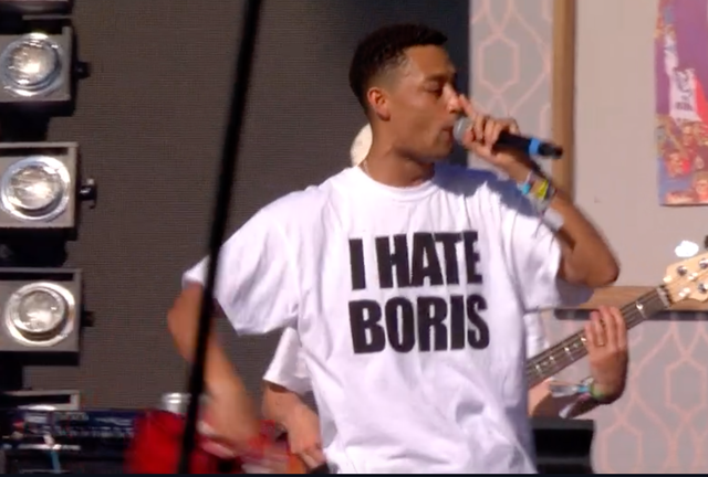 Loyle Carner wears an 'I Hate Boris' shirt during his Glastonbury set