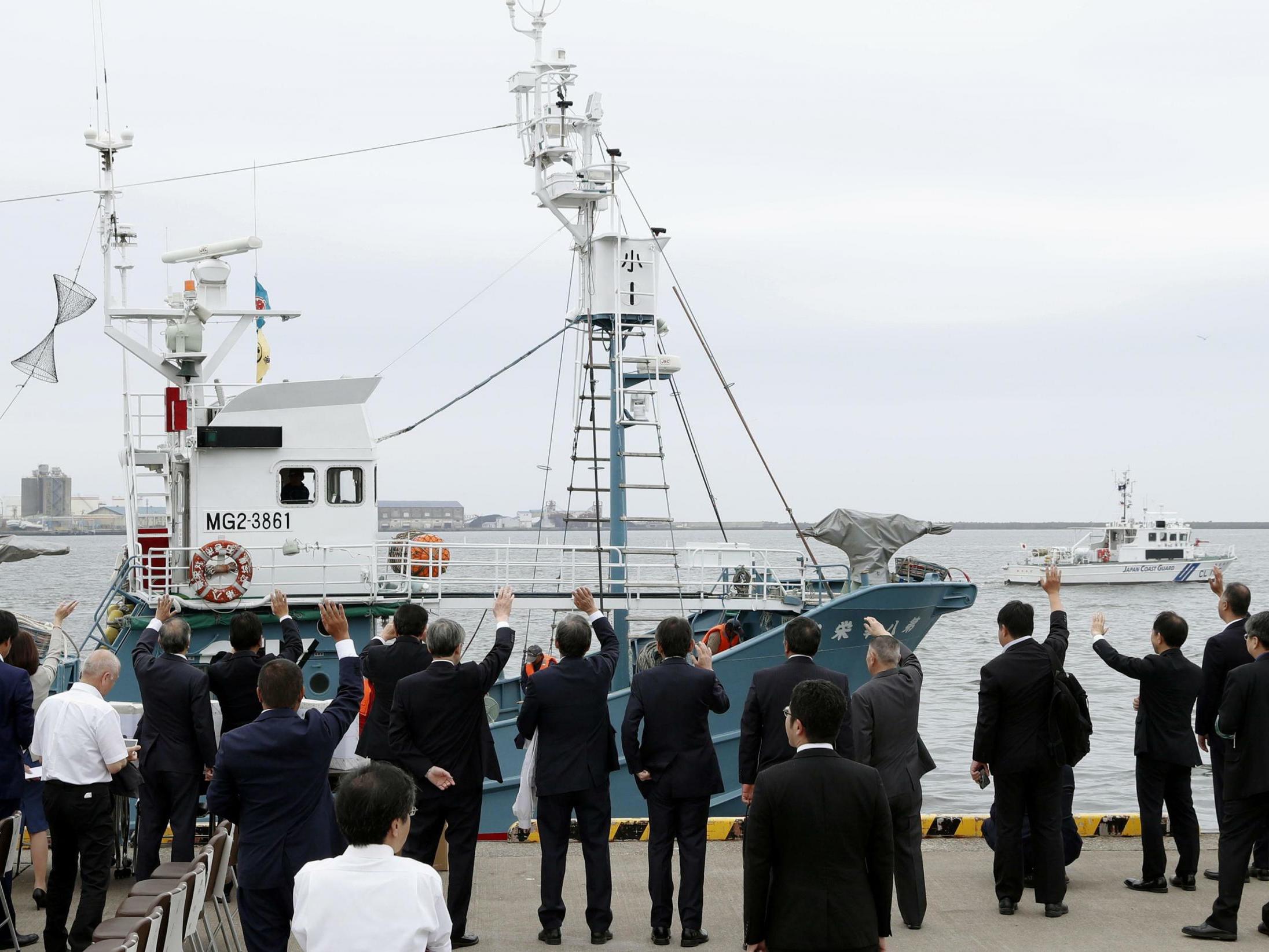 A whaling boat leaves a port in Kushiro, Hokkaido, northern Japan