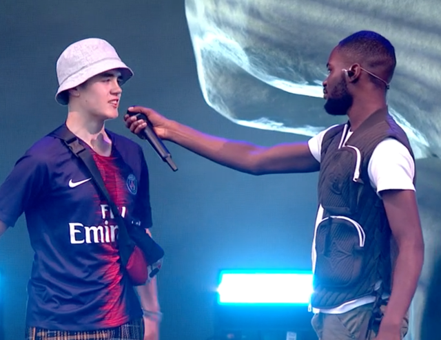 Rapper Dave (right) with fan Alex on the Other Stage at Glastonbury