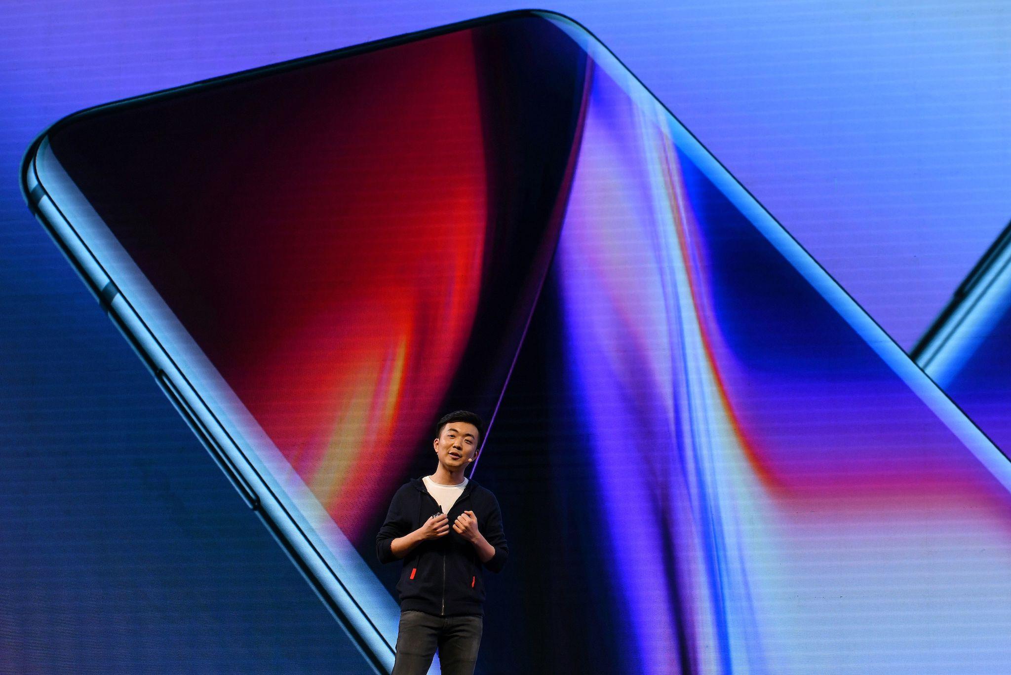 Co-founder and director of the Chinese smartphone maker OnePlus, Carl Pei gestures as he speaks on stage during the launch of their latest OnePlus 7 and the OnePlus 7 Pro