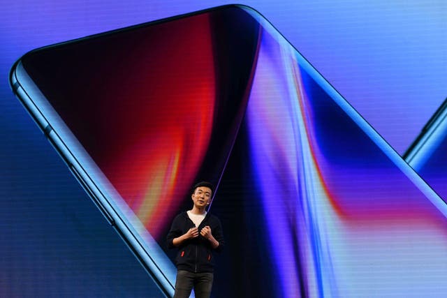 Co-founder and director of the Chinese smartphone maker OnePlus, Carl Pei gestures as he speaks on stage during the launch of their latest OnePlus 7 and the OnePlus 7 Pro