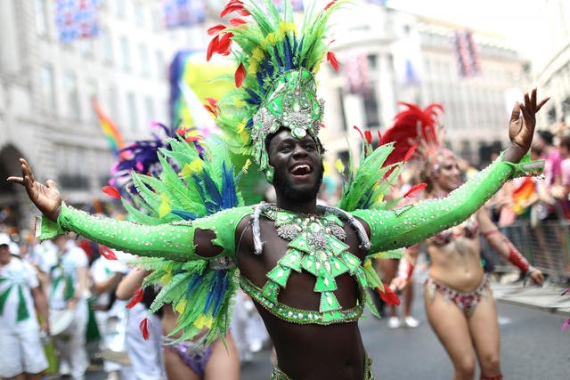 A parade-goer is photographed on Regent's Street during the 2018 Pride in London parade