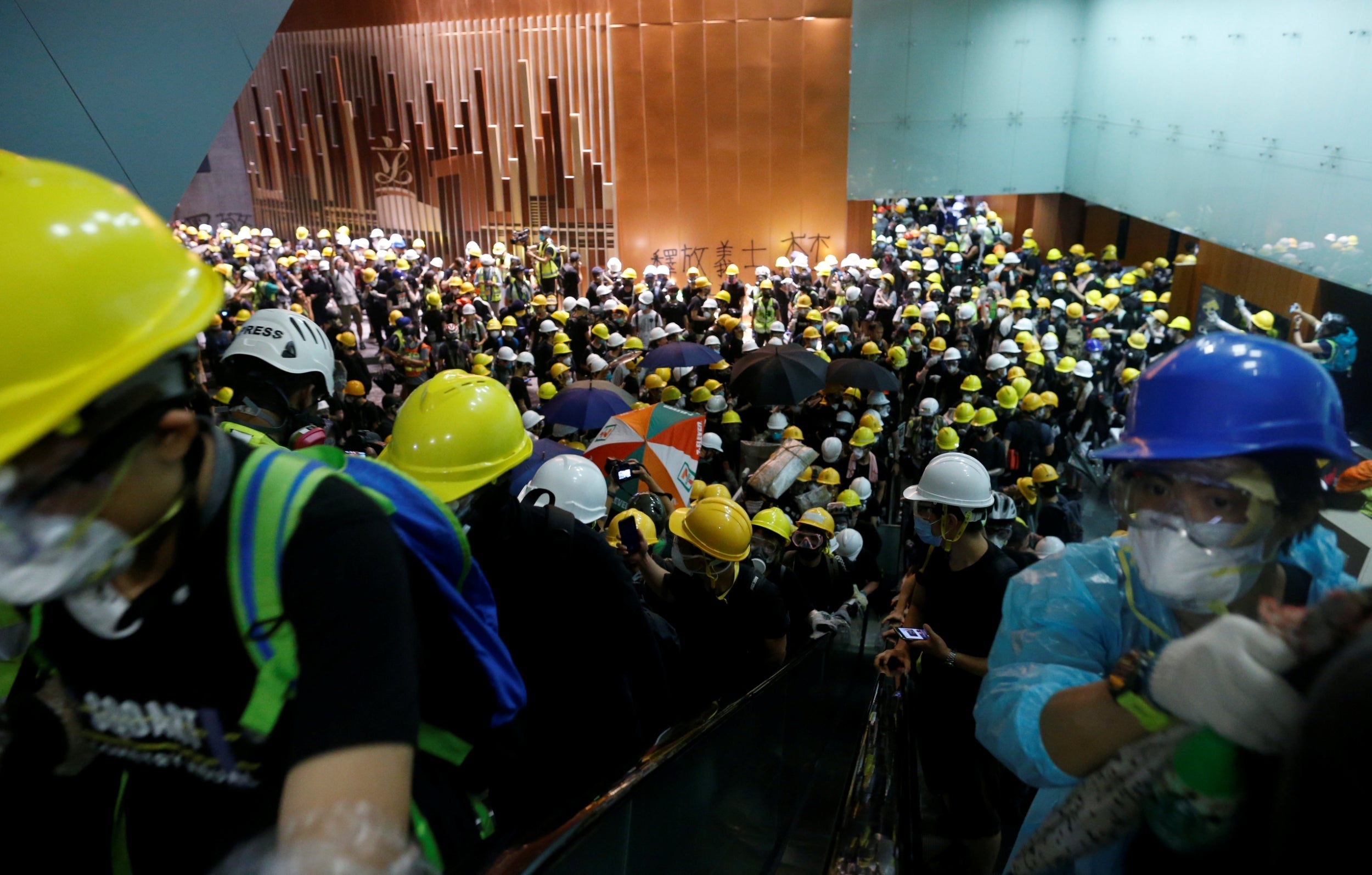 Protesters break into the Legislative Council building during the anniversary of Hong Kong's handover to China in Hong