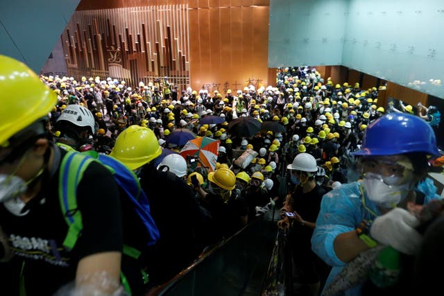 Protesters break into the Legislative Council building during the anniversary of Hong Kong's handover to China in Hong