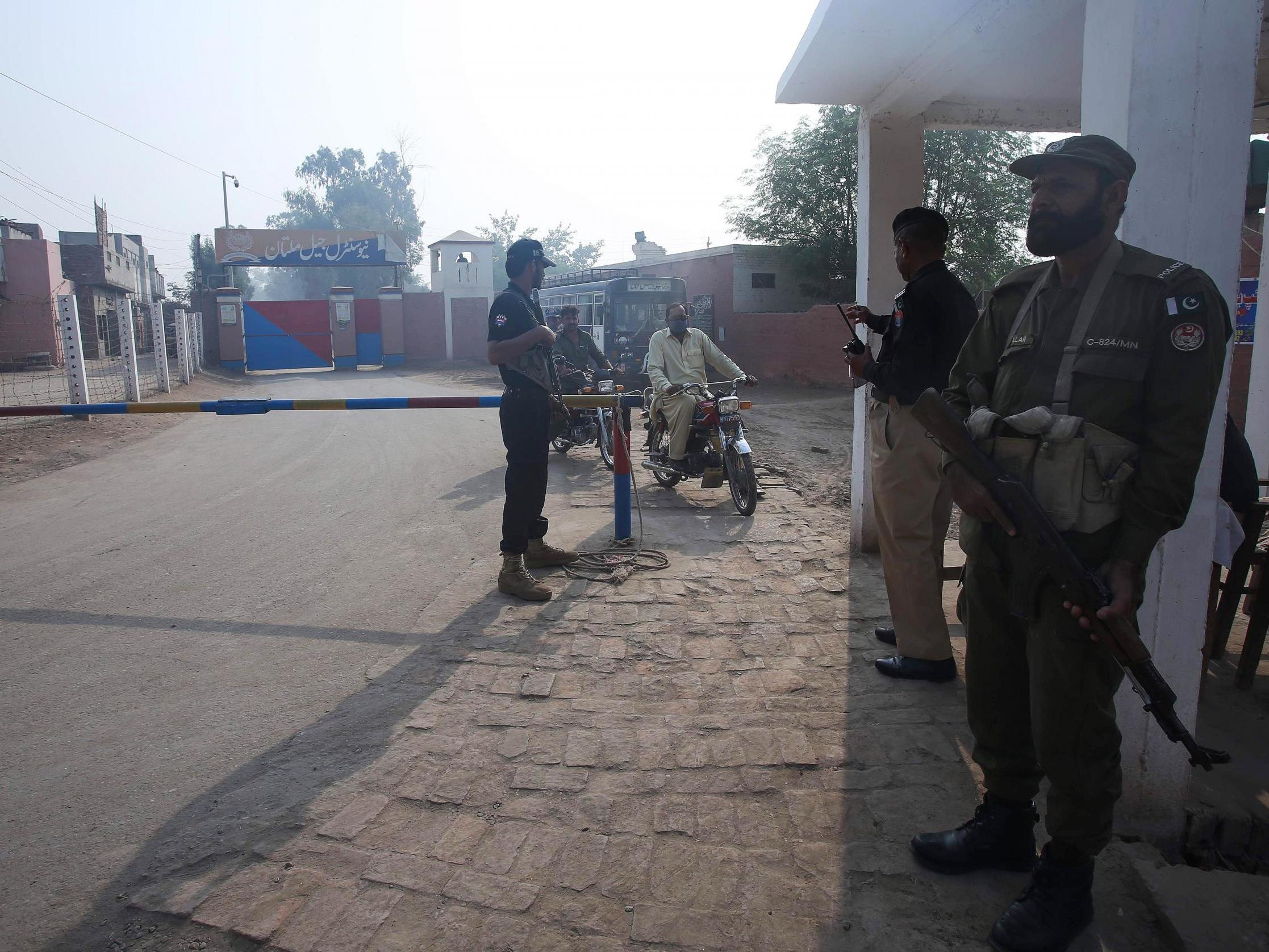 Pakistani paramilitary troopers patrol outside a central jail in Multan. Muhammad Ajmal has been charged with the murder of nine of his relatives