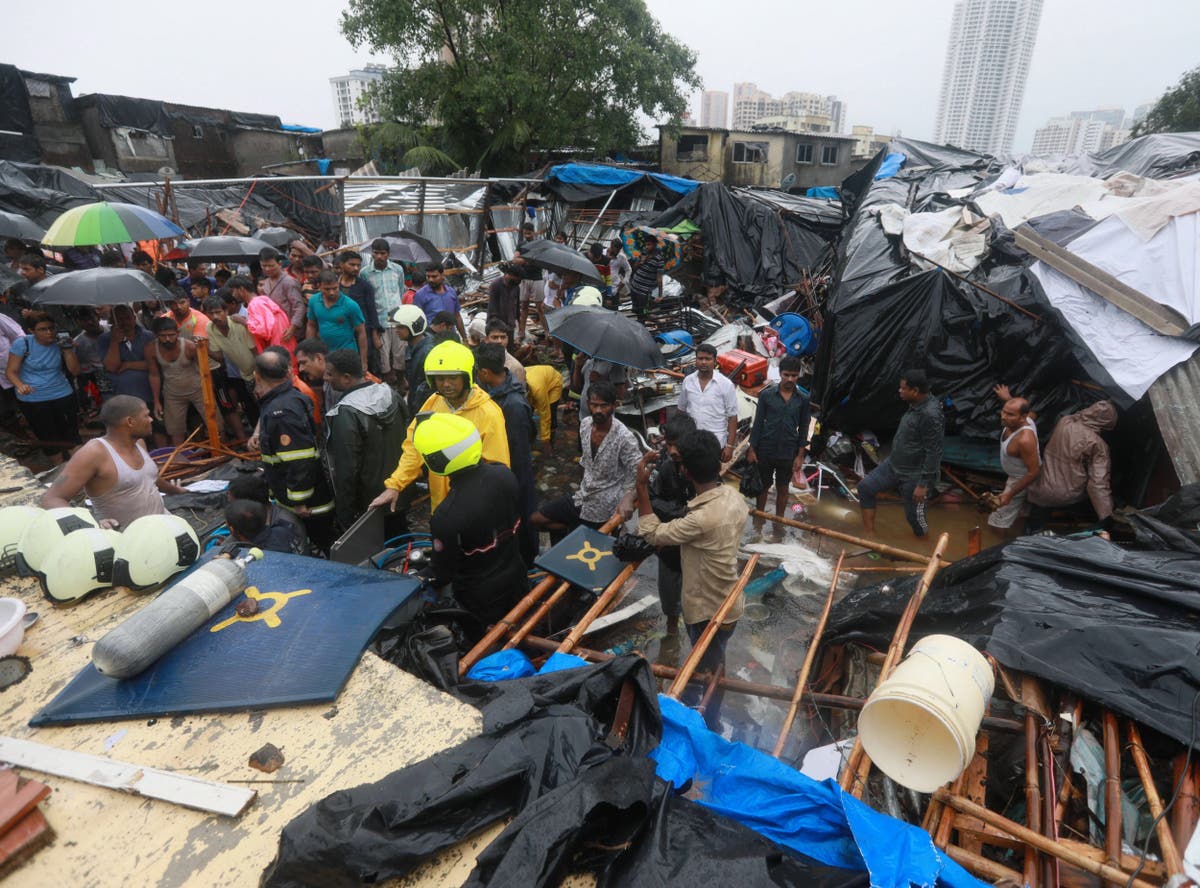 India floods: At least 27 dead as walls collapse on shanty homes in Mumbai and western cities