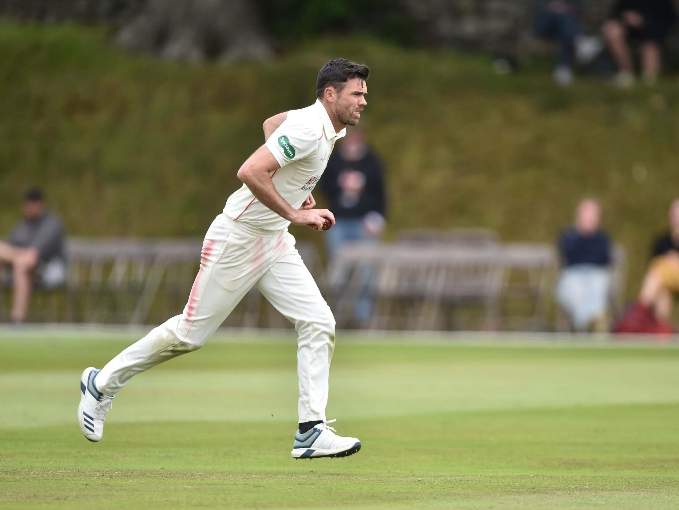 James Anderson runs in to bowl for Lancashire