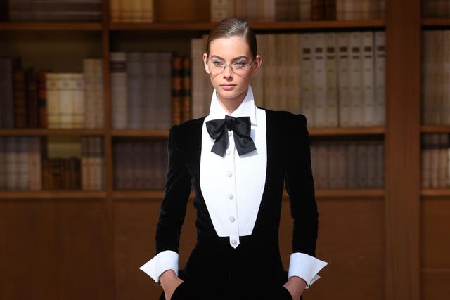 A model presents a creation by Chanel during the Women's Fall-Winter 2019/2020 Haute Couture collection fashion show at the Grand Palais turned into a giant library in Paris, on July 2, 2019.