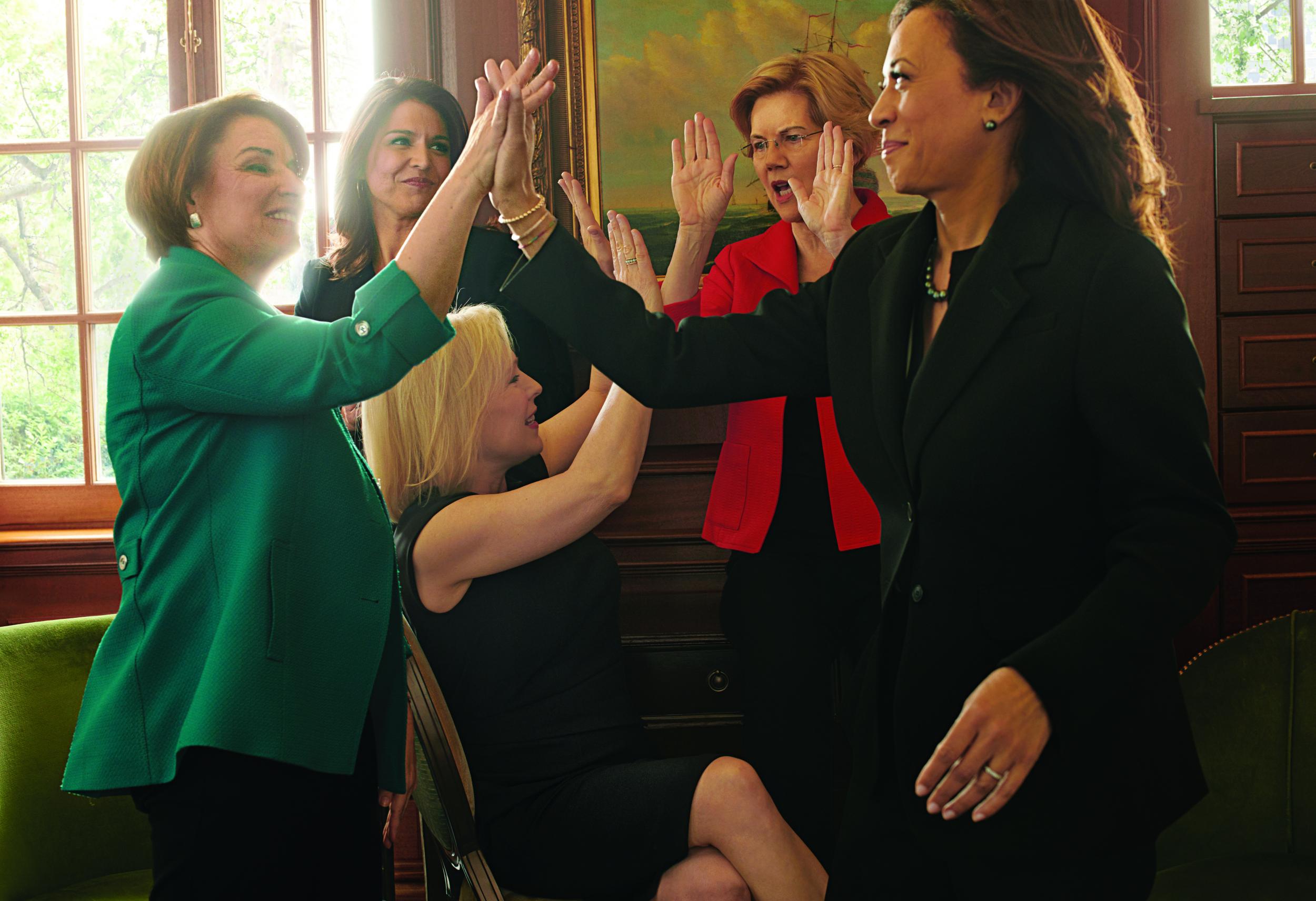 The five presidential candidates high five in image captured by portrait photographer Annie Leibovitz (Annie Leibovitz/Vogue)