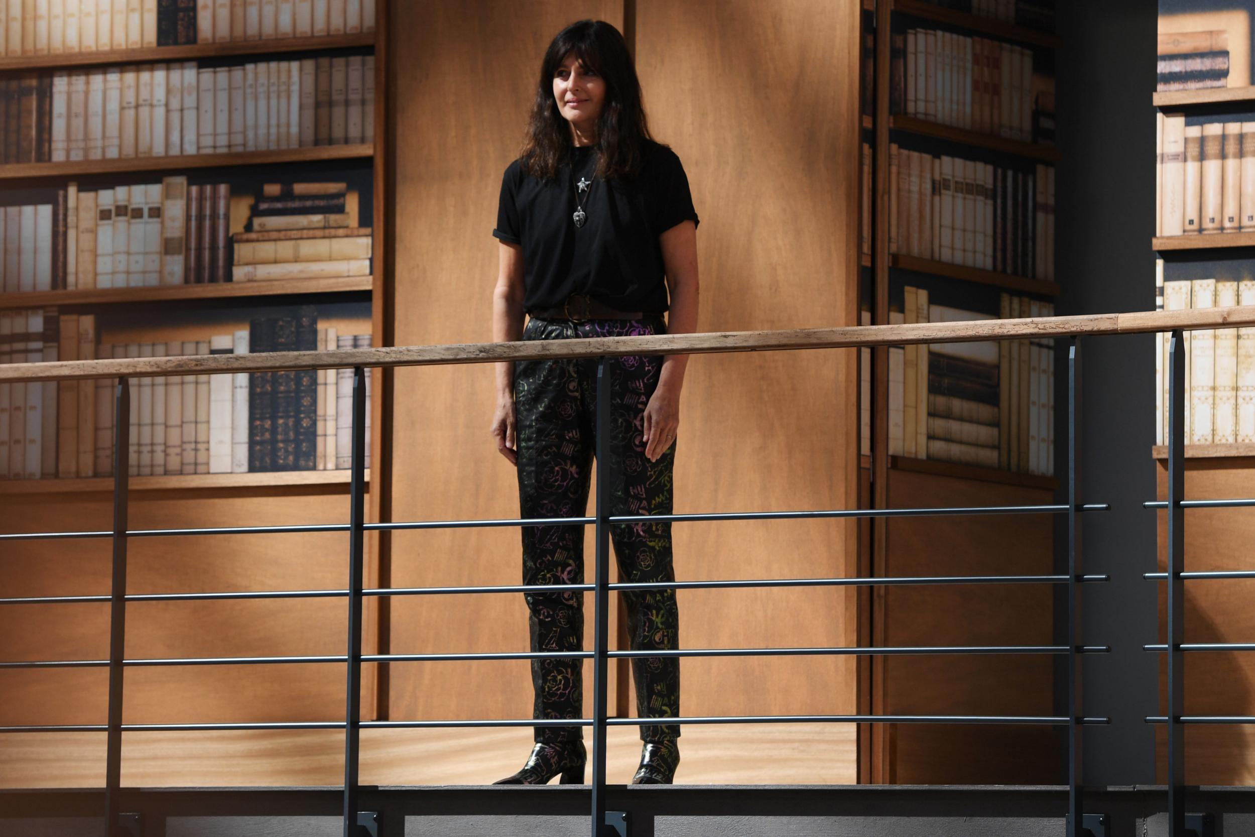 French fashion designer Virginie Viard acknowledges the audience at the end of the Chanel's Women Fall-Winter 2019/2020 Haute Couture collection fashion show at the Grand Palais turned into a giant library in Paris, on July 2, 2019.