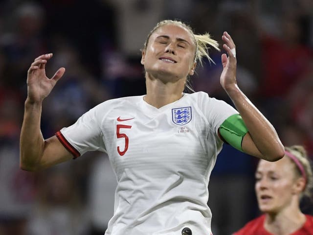 England's Steph Houghton reacts after missing a penalty