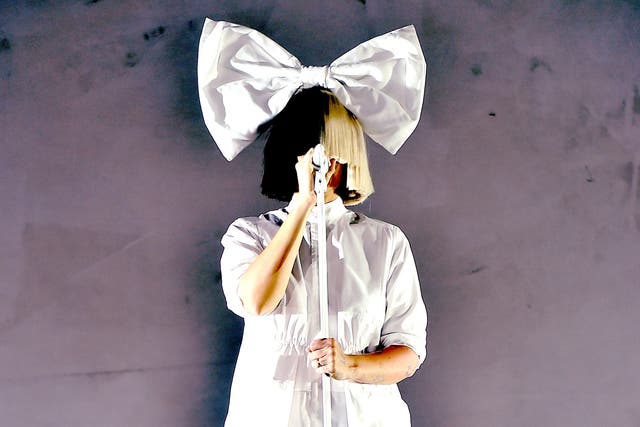 This image has been digitally filtered.) Singer Sia performs onstage during day 3 of the 2016 Coachella Valley Music & Arts Festival Weekend 1 at the Empire Polo Club on April 17, 2016 in Indio, California.
