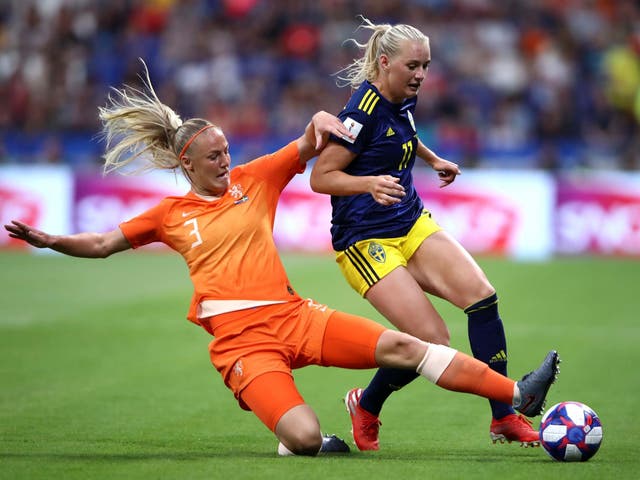 Sweden's Stina Blackstenius is challenged by Stefanie van der Gragt