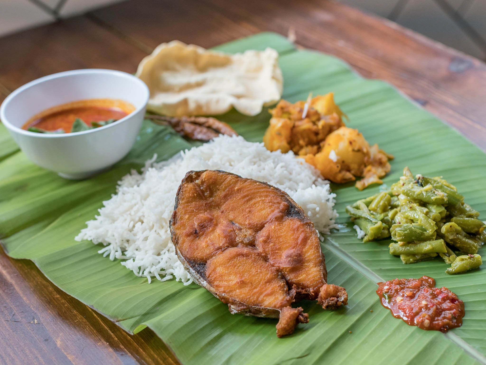 Banana leaf dishes, like this, with curries and rice is a classic dish