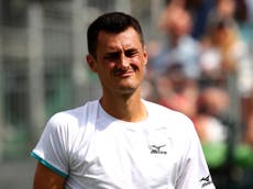 Tomic fined entire match fee for lack of effort against Tsonga