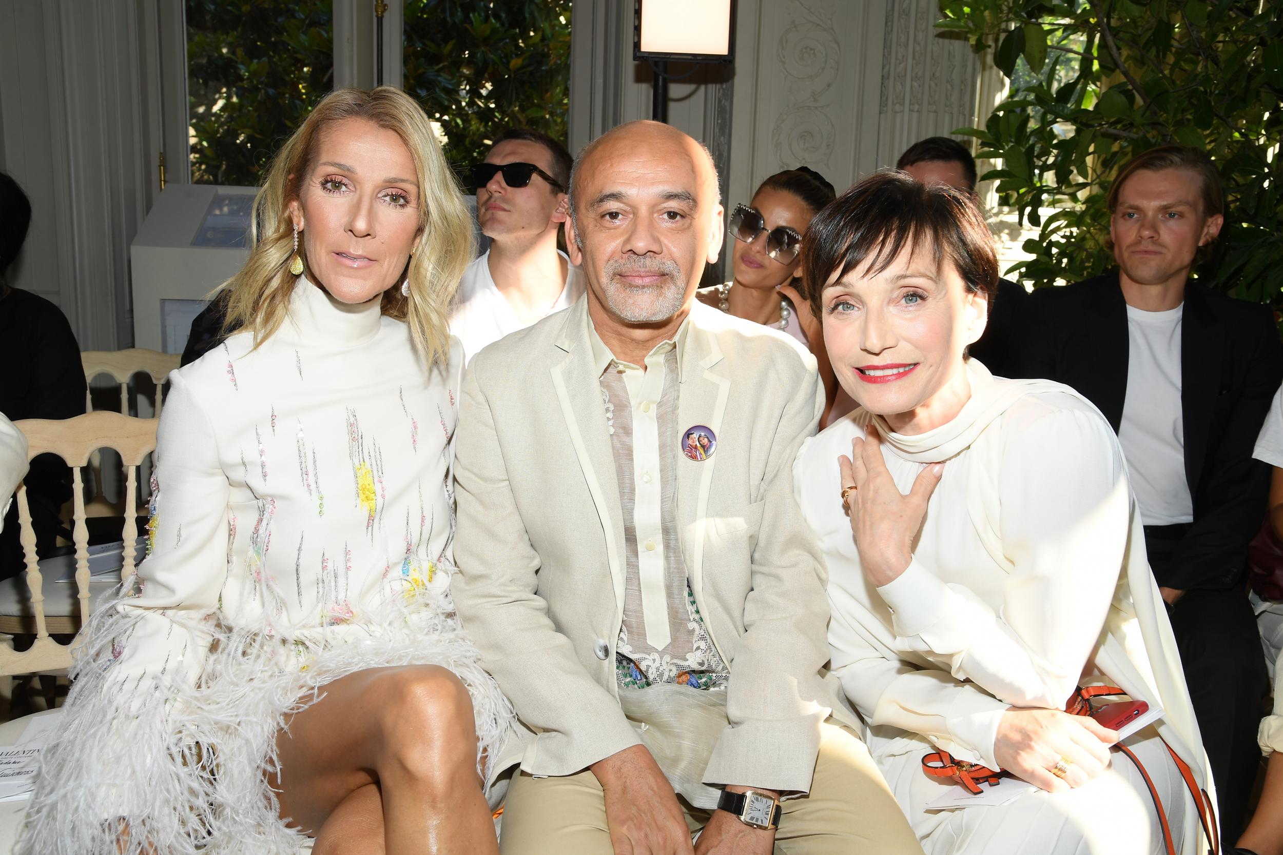 Louboutin with Celine Dion and Kristen Scott Thomas at the Valentino Haute Couture fashion show on Wednesday