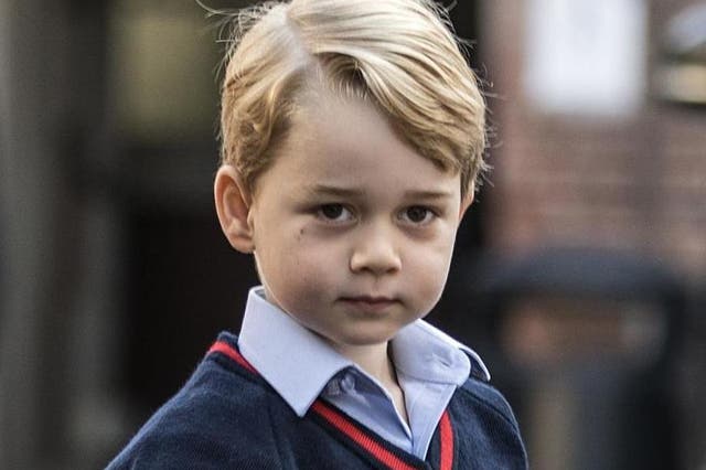 Prince George arrives for his first day of school at Thomas's school in Battersea.