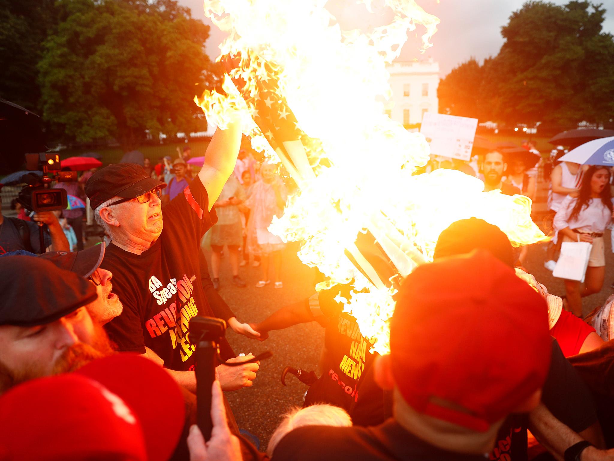 Trump Fans In Violent Clashes With Communists After American Flag