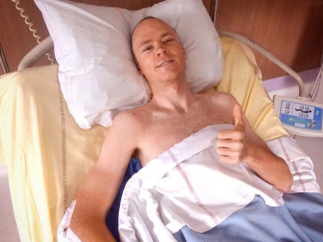 Chris Froome pictured in his hospital bed in St Etienne