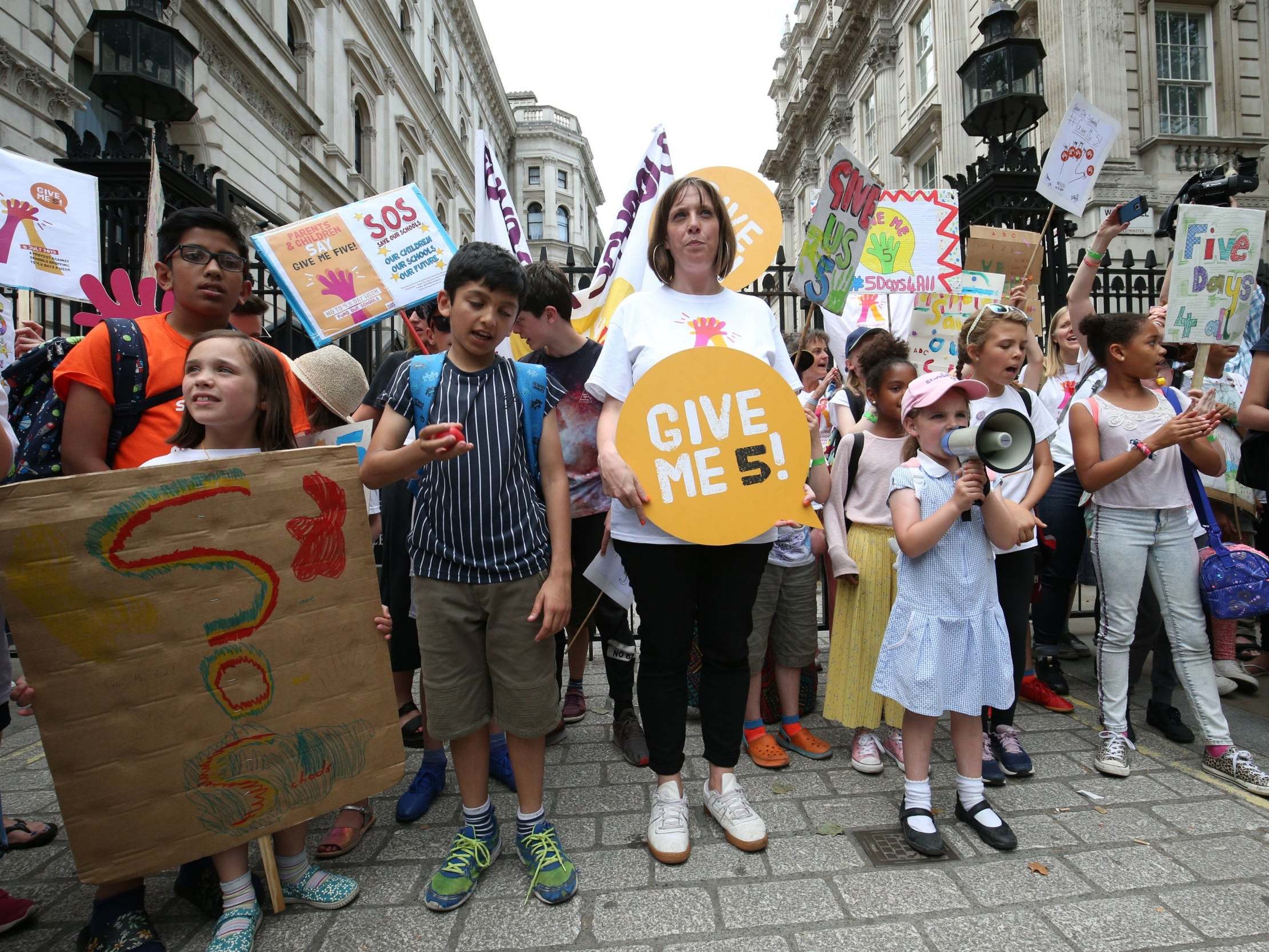 Labour MP Jess Phillips joins a protest against schools being forced to close early