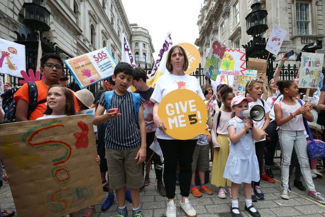 Labour MP Jess Phillips joins a protest against schools being forced to close early