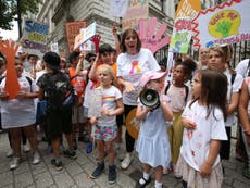 Hundreds of children and parents march over shorter school weeks