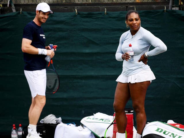 Andy Murray speaks with mixed doubles partner Serena Williams