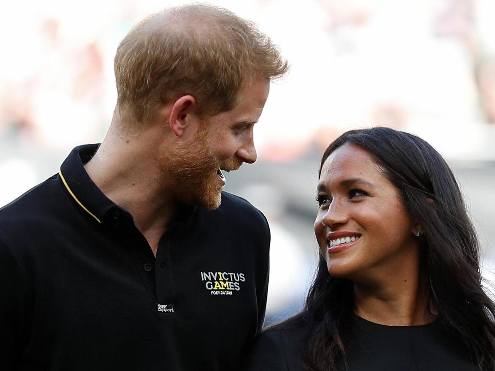 Harry and Meghan at a recent baseball game in London.