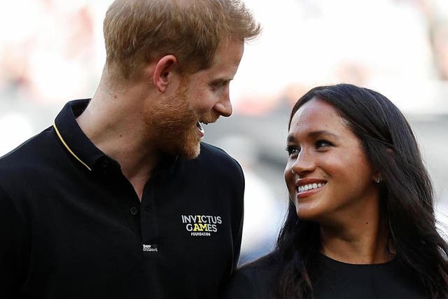 Harry and Meghan at a recent baseball game in London.