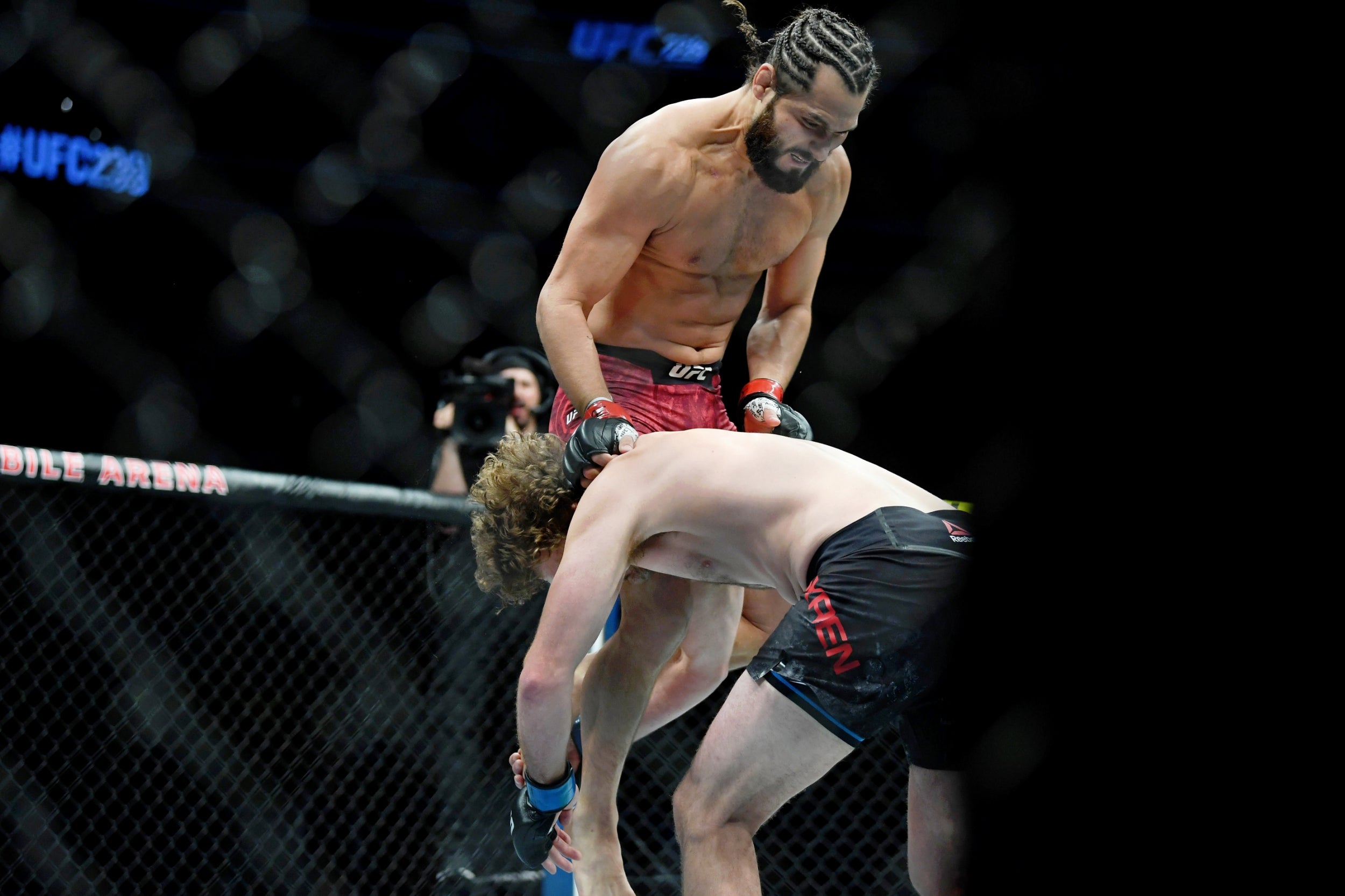 Jorge Masvidal charged out of his corner to deliver an immediate flying knee (Reuters)