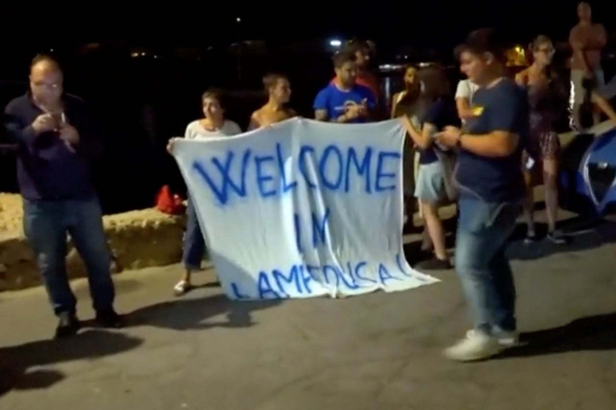 Migrants disembark from rescue boat in Italy despite Salvini ban