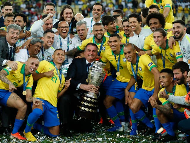 Brazilian President Jair Bolsonaro celebrates with the team