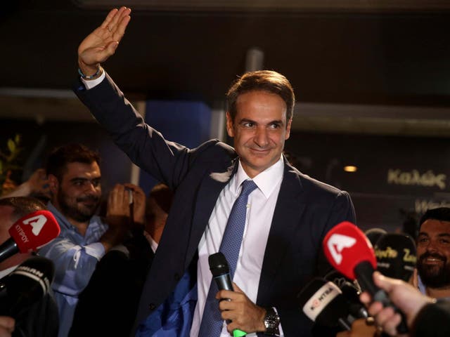 Greek opposition New Democracy conservative party leader Kyriakos Mitsotakis talks to his supporters
