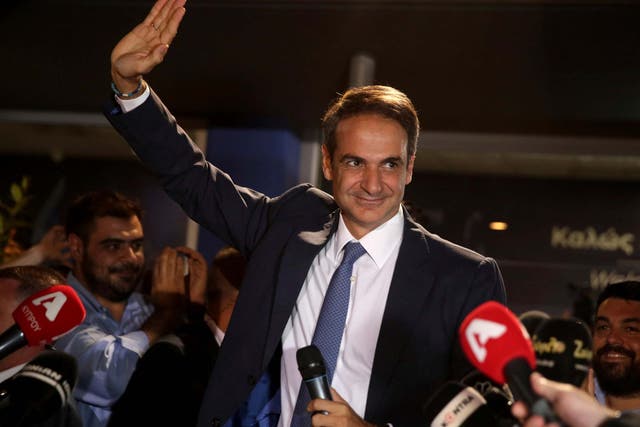 Greek opposition New Democracy conservative party leader Kyriakos Mitsotakis talks to his supporters
