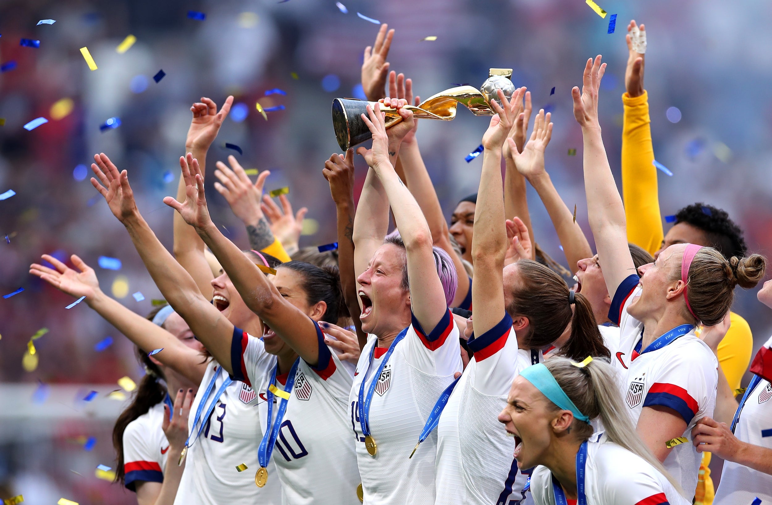 The USA celebrate with the trophy