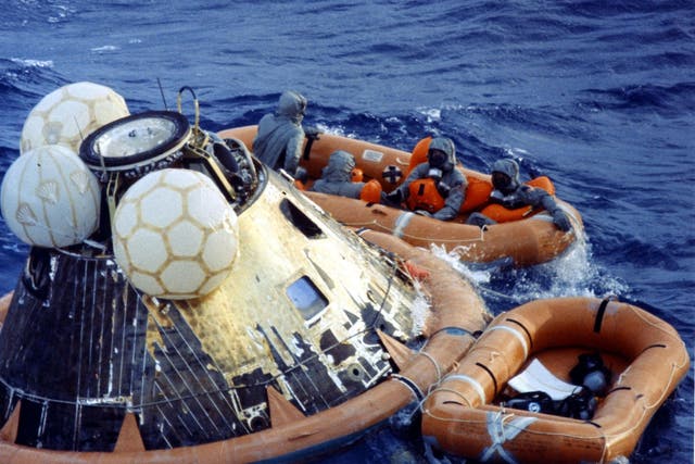 Astronauts Neil A. Armstrong, Michael Collins And Edwin E. Aldrin Jr. After Getting Into The Life Raft During Recovery Operations Today At The Completion Of Their Successful Lunar Landing Mission