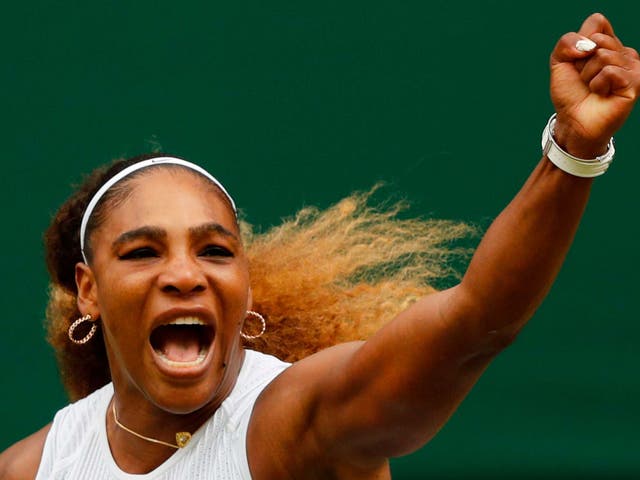 Williams celebrates taking the first set