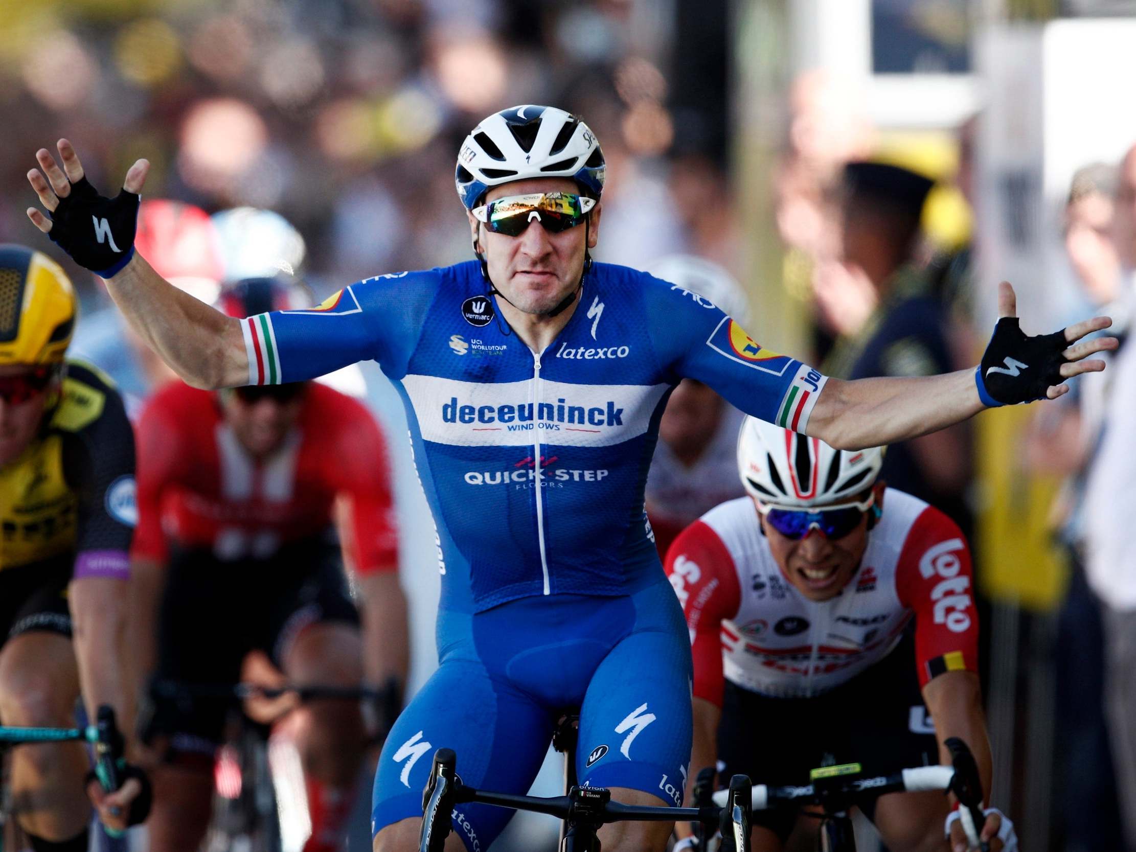 Elia Viviani crosses the finish line to win stage four