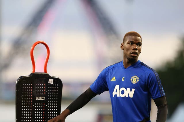 Paul Pogba has travelled with United to Australia