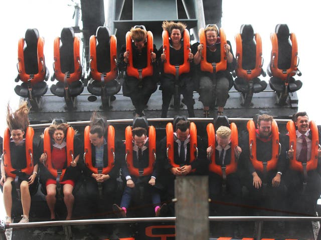 University students take part in graduation ceremony on rollercoaster