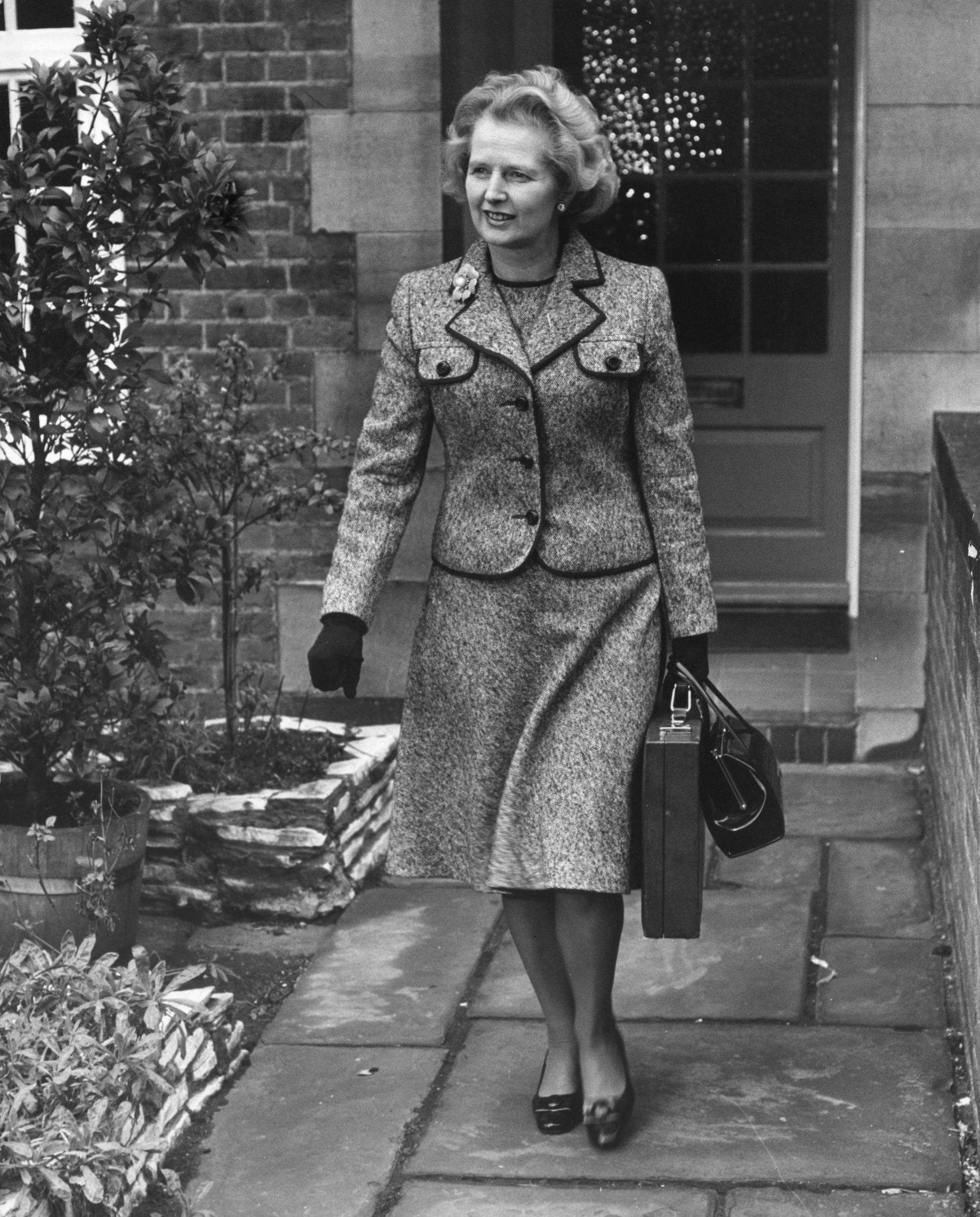 British politician Margaret Thatcher leaving her Chelsea home to attend the first ballot in the election for the leadership of the Conservative party.