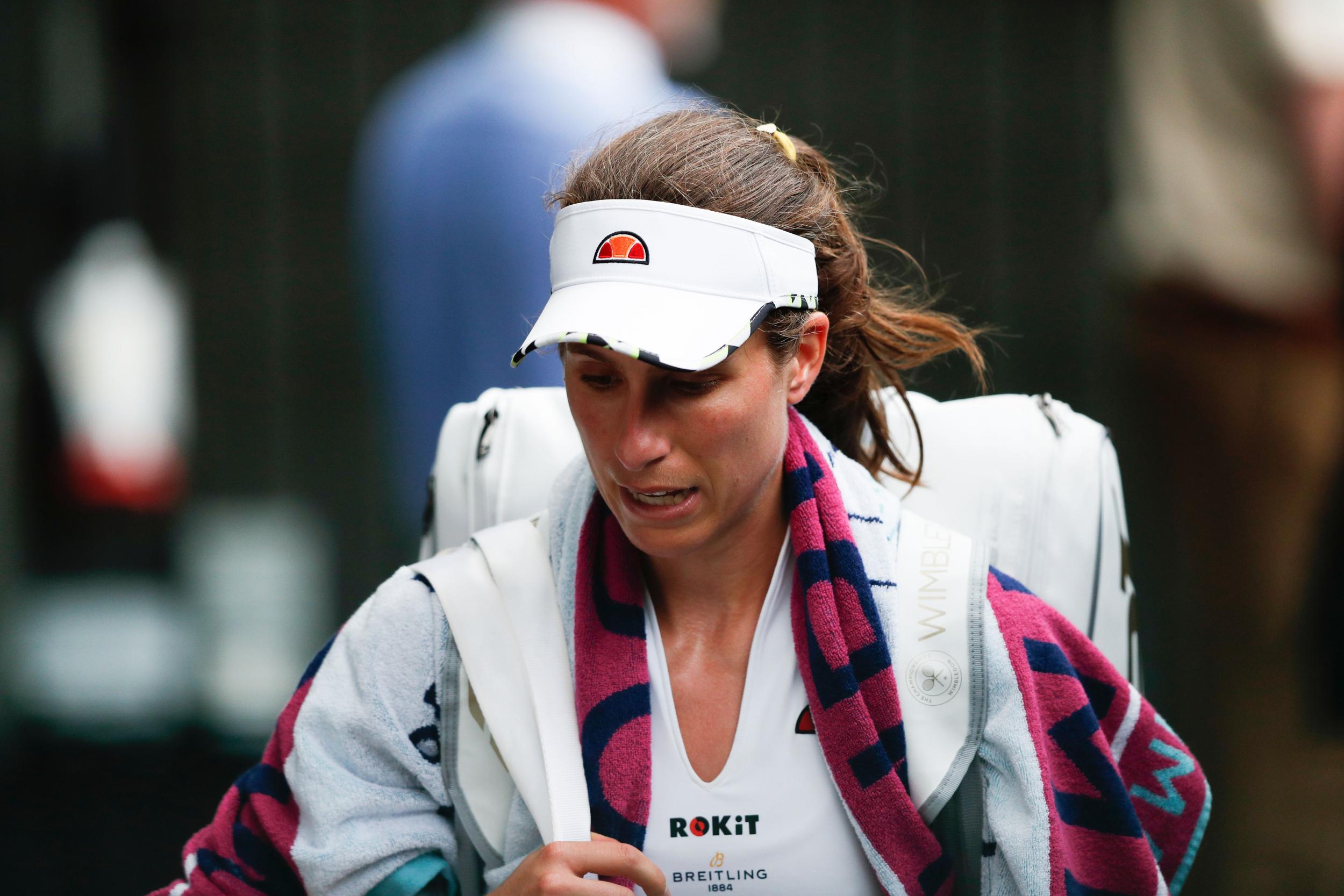 Britain's Johanna Konta leaves the court after losing against Czech Republic's Barbora Strycova during their women's singles quarter-final match on day eight of the 2019 Wimbledon Championships at The All England Lawn Tennis Club in Wimbledon, southwest London, on July 9, 2019