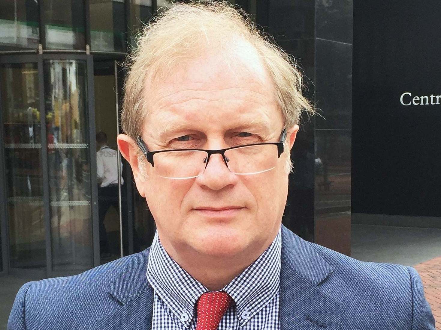 Dr David Mackereth, pictured outside the employment tribunal building in Birmingham.