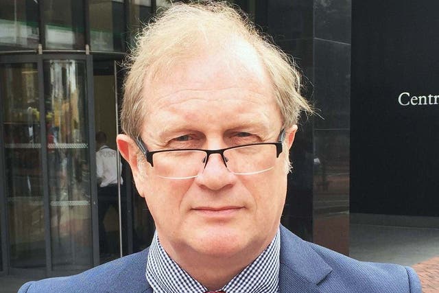 Dr David Mackereth, pictured outside the employment tribunal building in Birmingham.