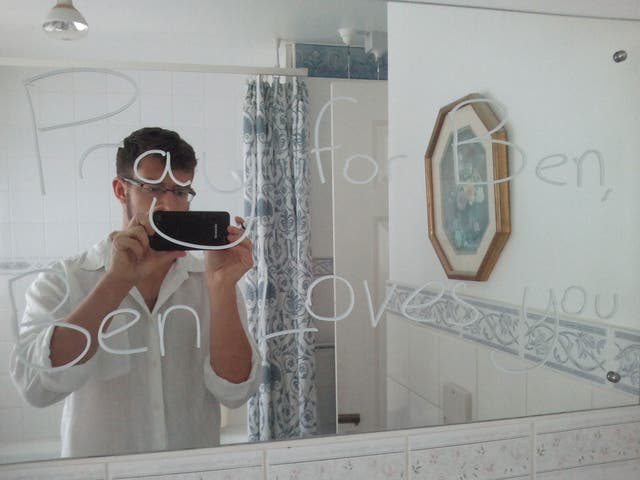 A selfie taken by Ben Field with one of the message he wrote on a mirror in Ann Moore-Martin’s home, reading: ‘Pray for Ben, Ben loves you’