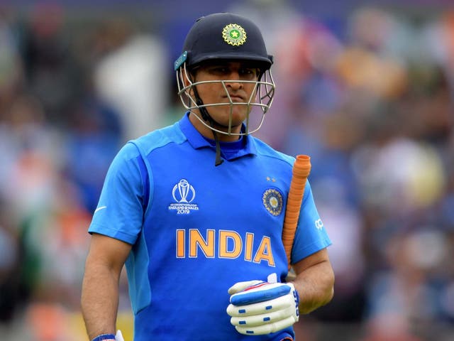 Dhoni walks off after being run out