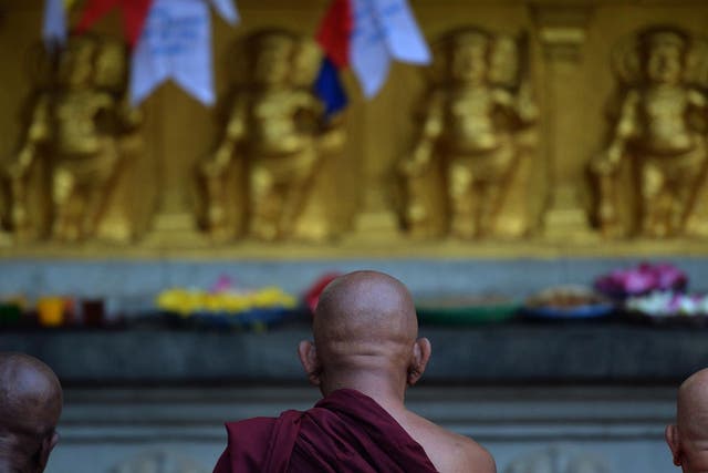 Bhikkhus pray at the Kelaiya temple, Colombo, for victims of the Easter attacks