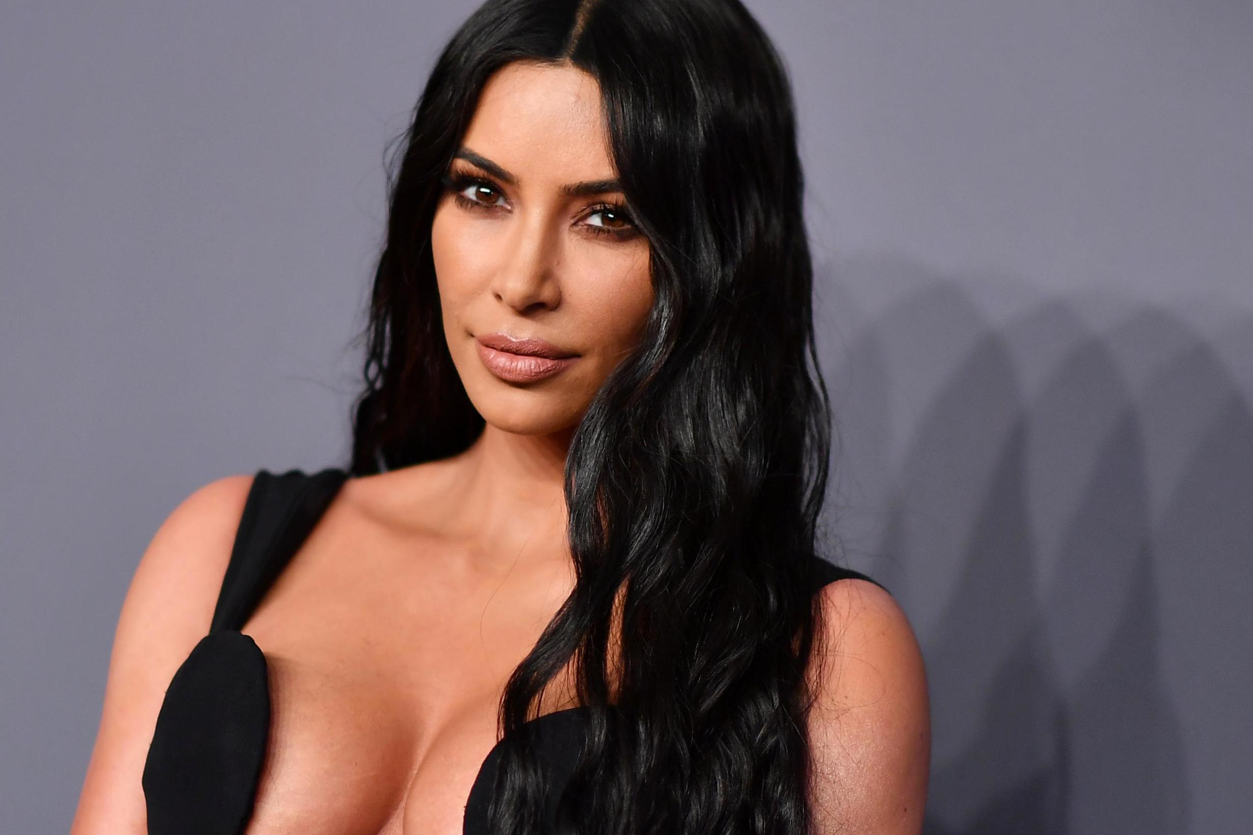 Fans Think Kim Kardashian Looks Like Donatella Versace In MFW Photos